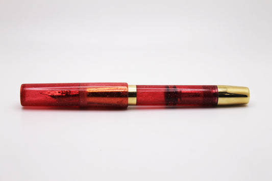 Ferryman Piston Filler in Cherry Red and Brass