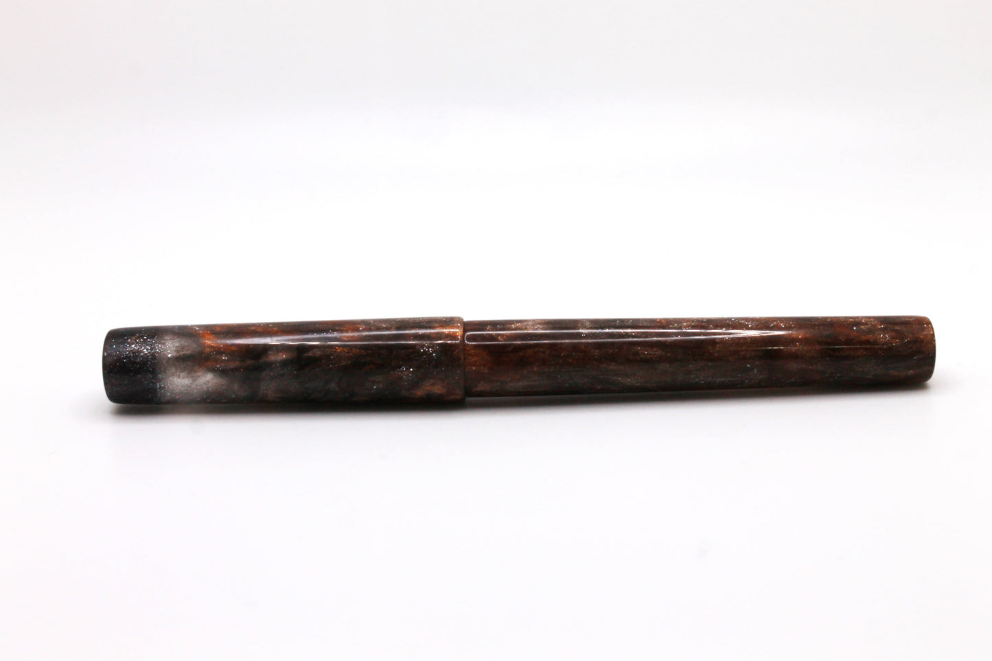 Mistress Model in Brown, Copper, and Silver resin