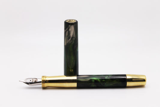 Ferryman Piston Filler in Green, Black, and Brass