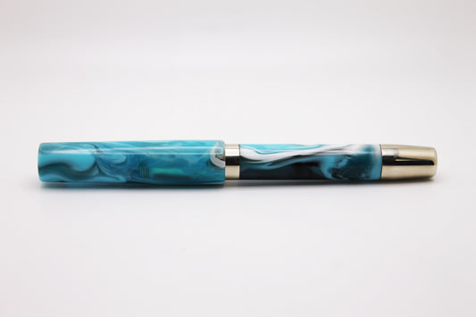 Ferryman Piston Filler in Blue, White, and Nickel Silver