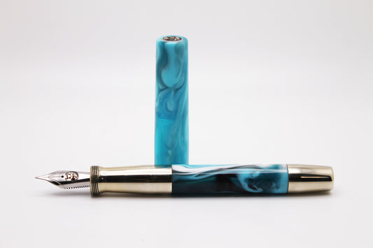 Ferryman Piston Filler in Blue, White, and Nickel Silver